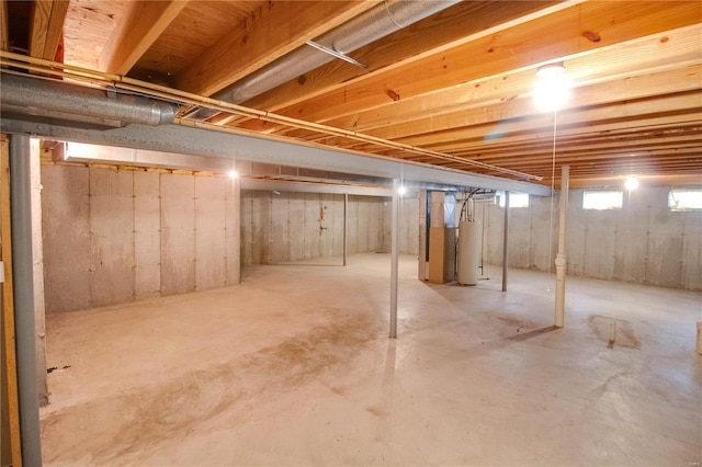 basement featuring water heater