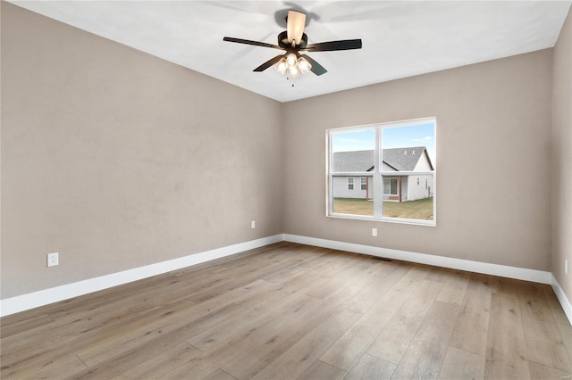 unfurnished room with light hardwood / wood-style floors and ceiling fan