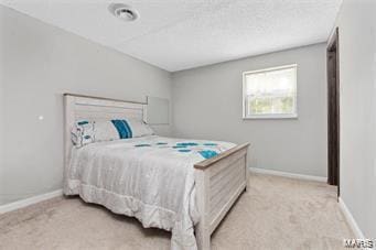 bedroom featuring light colored carpet