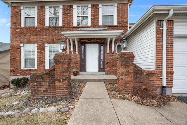 entrance to property featuring a garage