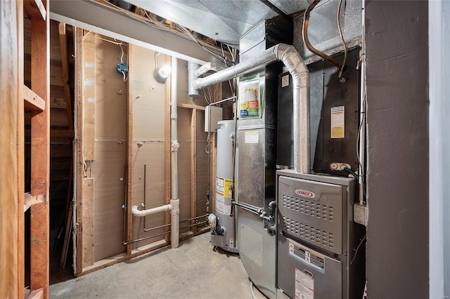 utility room featuring gas water heater