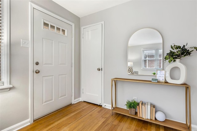 foyer entrance featuring light wood-type flooring