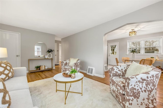 living room with light hardwood / wood-style floors