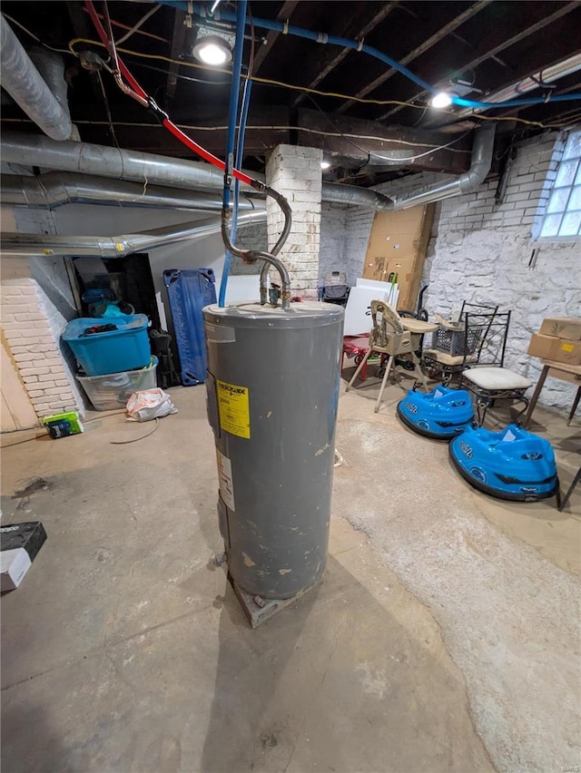 unfinished below grade area with electric water heater