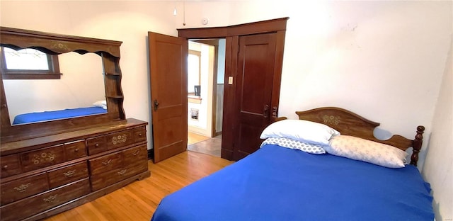 bedroom featuring light hardwood / wood-style floors