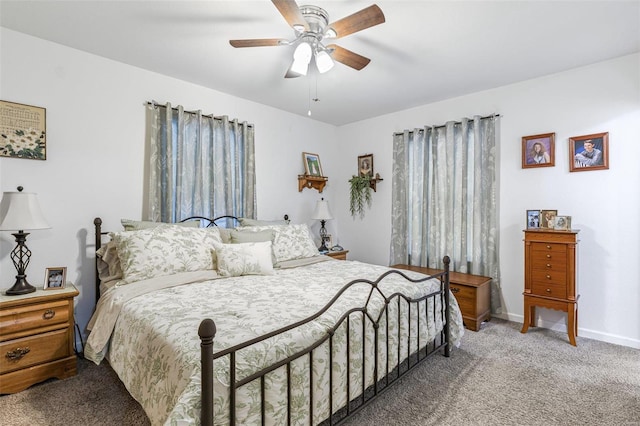 bedroom with ceiling fan and carpet floors