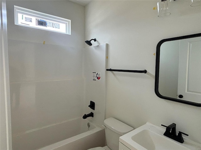 full bathroom with vanity, tub / shower combination, and toilet