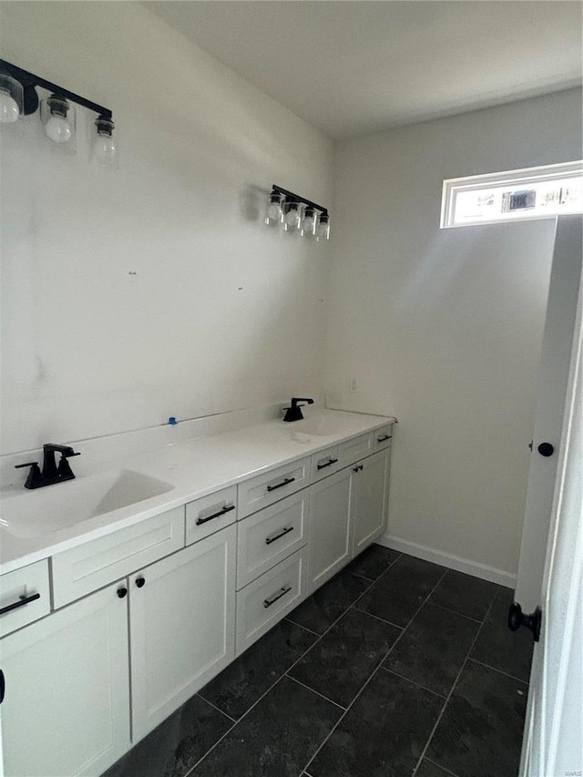 bathroom featuring vanity and tile patterned flooring