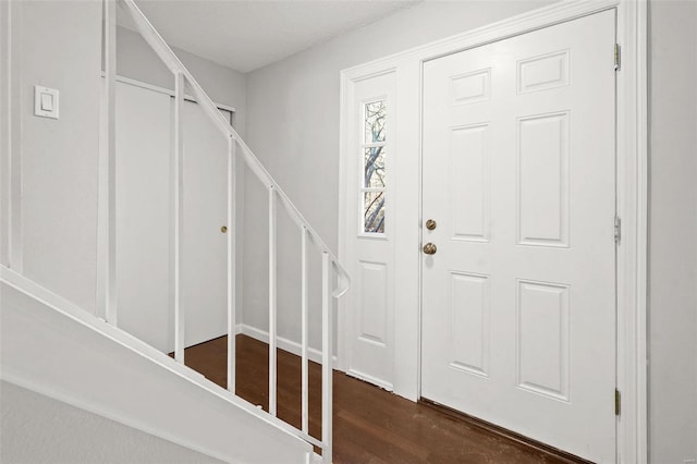 entryway featuring dark wood-style floors