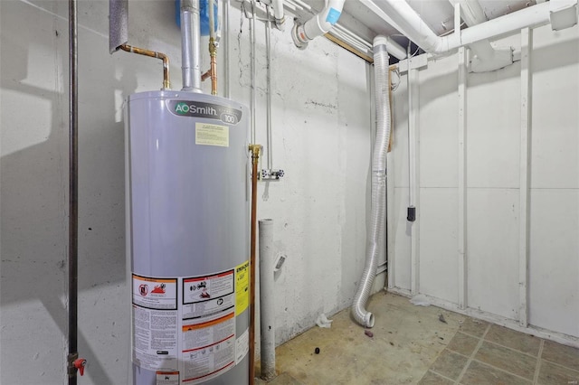 utility room featuring water heater