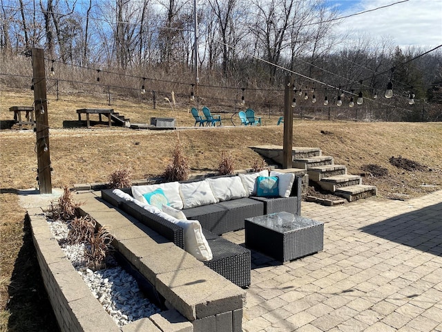 view of patio / terrace featuring an outdoor hangout area and fence