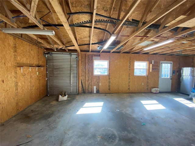 interior space featuring freestanding refrigerator