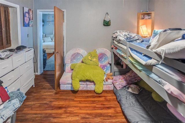 bedroom featuring dark wood-type flooring