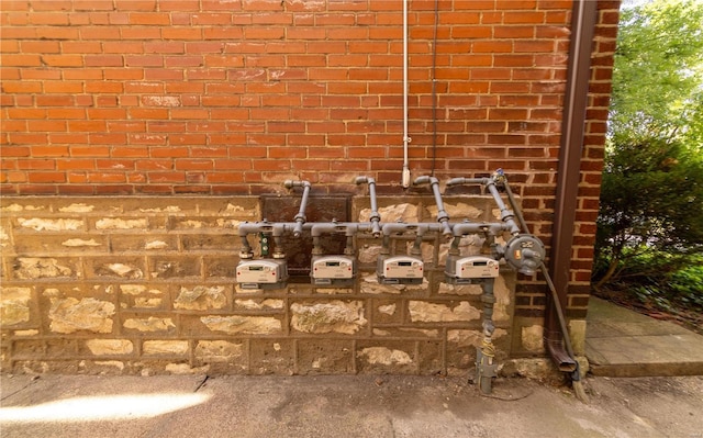 exterior details featuring brick siding