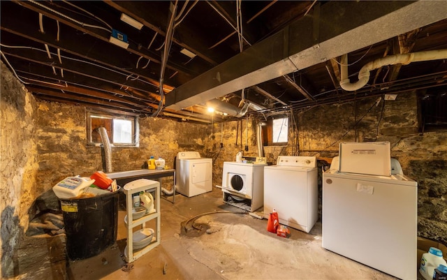 below grade area featuring washing machine and dryer