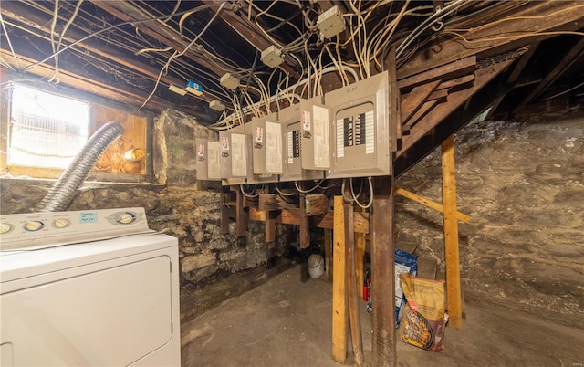 basement featuring washer / clothes dryer and electric panel