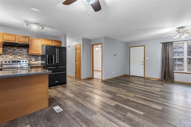 kitchen with high quality fridge, tasteful backsplash, dark hardwood / wood-style flooring, electric range, and ceiling fan