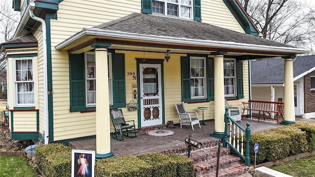 entrance to property with covered porch