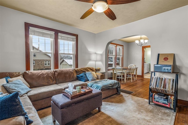 living room featuring hardwood / wood-style flooring and ceiling fan