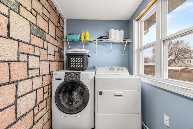 laundry area with washer and dryer