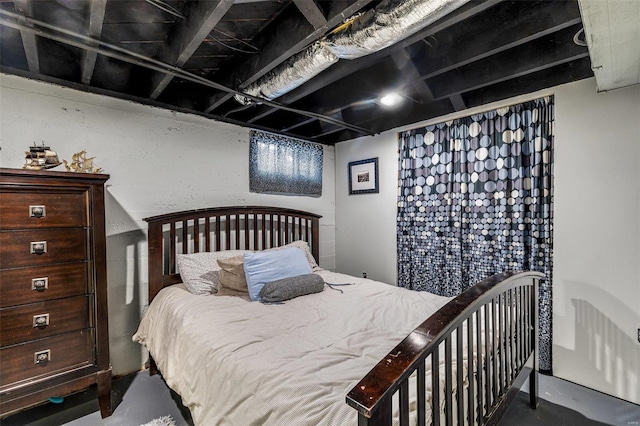 bedroom with concrete flooring