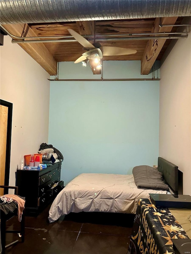 bedroom featuring beamed ceiling and wood ceiling