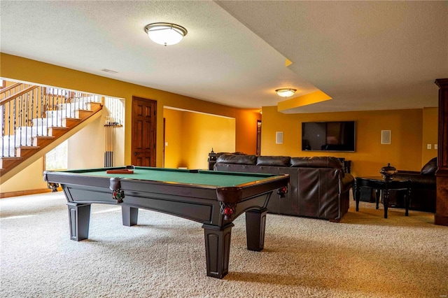 game room with carpet flooring, a textured ceiling, and billiards