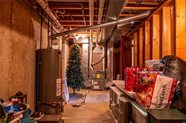 basement with heating unit and water heater