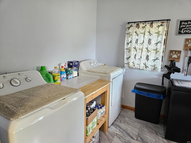 washroom featuring independent washer and dryer