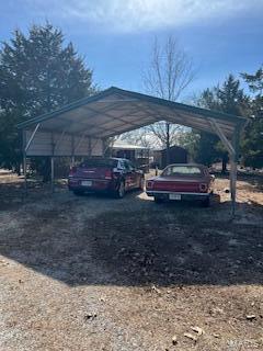 view of car parking with a carport