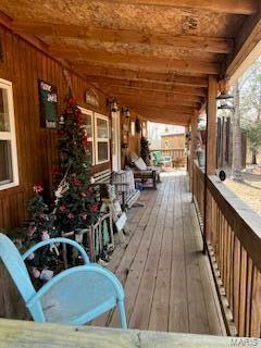 deck with covered porch