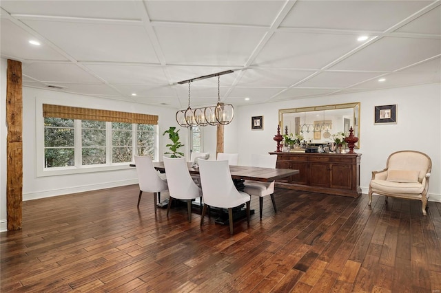 dining area with coffered ceiling, recessed lighting, dark wood finished floors, and baseboards