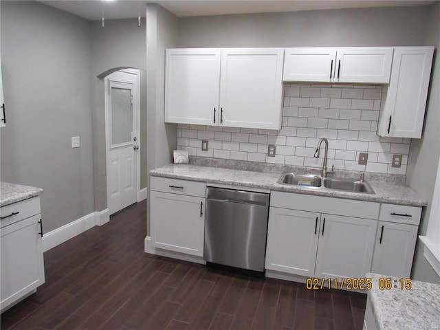 kitchen featuring white cabinetry, sink, and stainless steel dishwasher