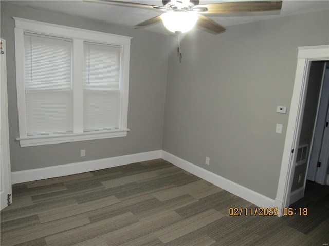 empty room featuring ceiling fan