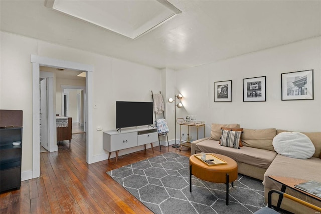 living room featuring dark wood-type flooring