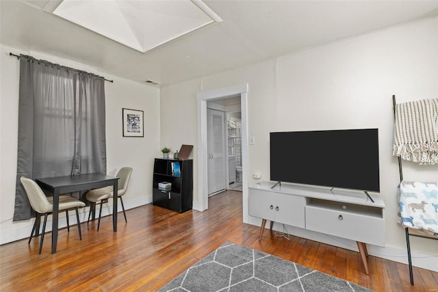 living room featuring dark hardwood / wood-style flooring