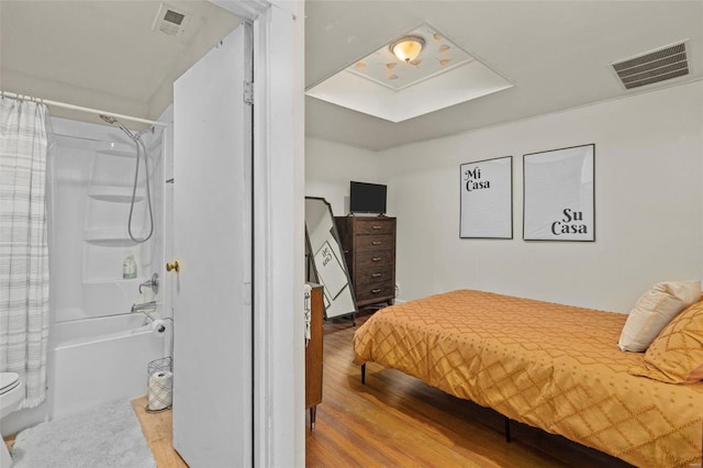 bedroom with light wood-type flooring