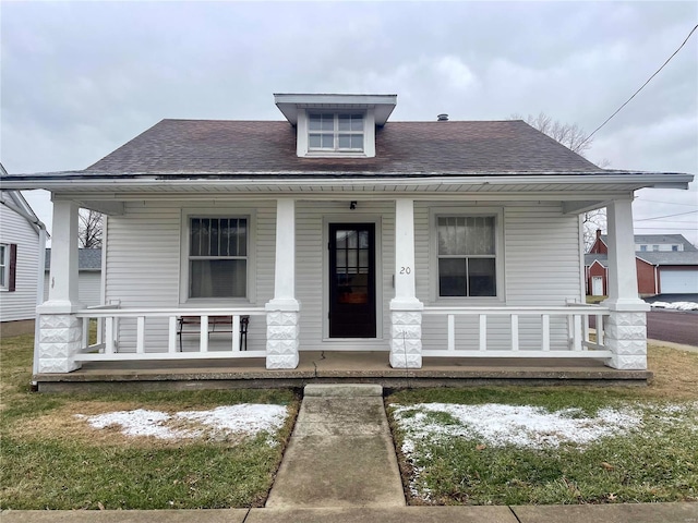 bungalow featuring covered porch