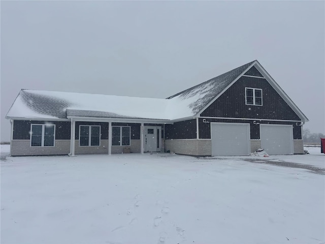 view of front of home with a garage