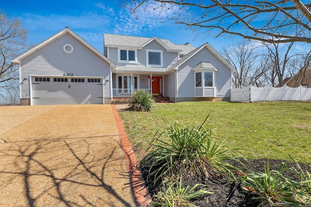 traditional-style home featuring a front lawn, driveway, a porch, fence, and a garage