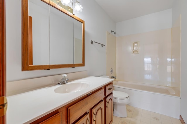 full bathroom featuring toilet, vanity, and bathtub / shower combination