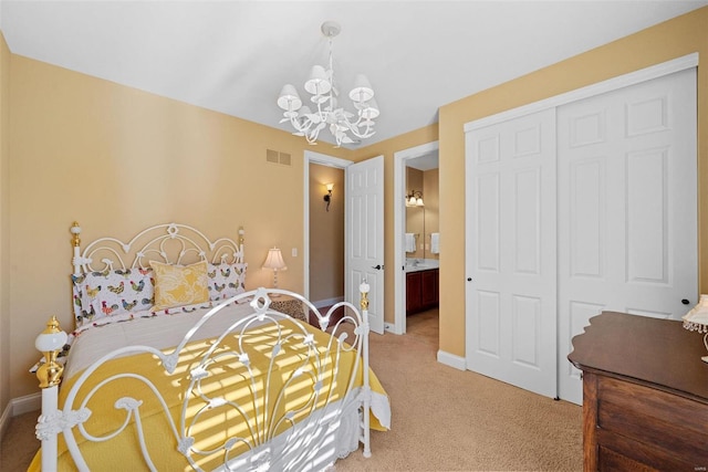 bedroom with a closet, baseboards, visible vents, light colored carpet, and a notable chandelier