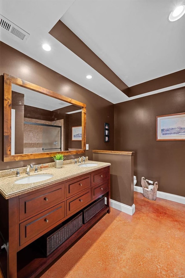 bathroom with recessed lighting, a sink, visible vents, baseboards, and an enclosed shower