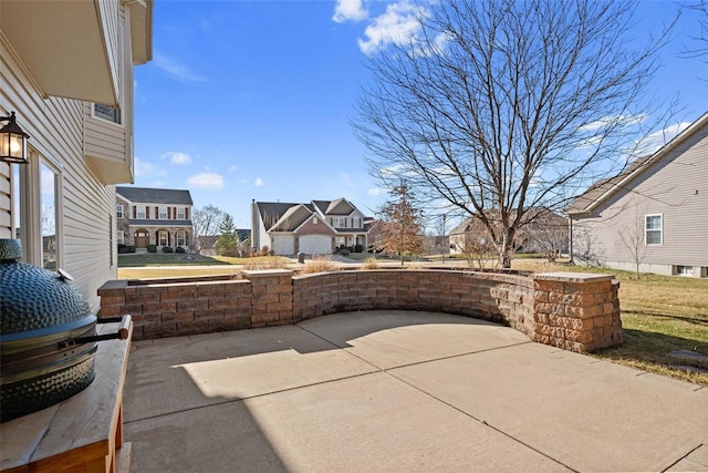 view of patio with a residential view