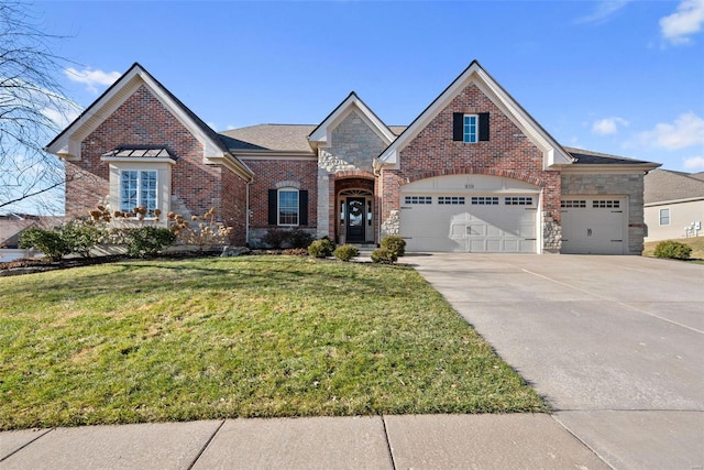 view of front of property featuring an attached garage, a front yard, concrete driveway, and brick siding