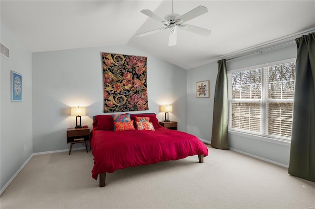 bedroom featuring visible vents, ceiling fan, baseboards, vaulted ceiling, and carpet flooring