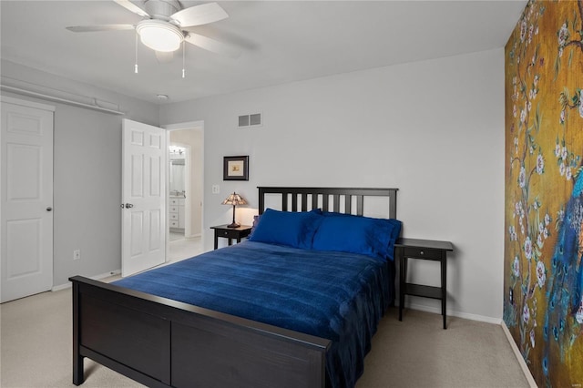 bedroom with a ceiling fan, baseboards, visible vents, and light carpet