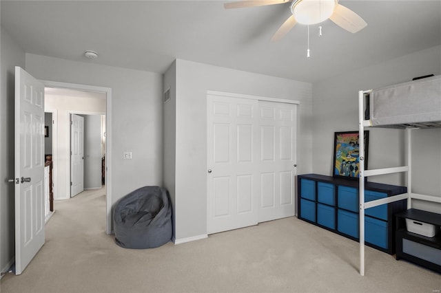 bedroom featuring visible vents, carpet floors, and ceiling fan