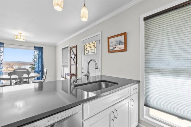 kitchen featuring decorative light fixtures, white cabinetry, sink, ornamental molding, and stainless steel dishwasher