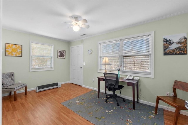 office with ceiling fan, ornamental molding, and light wood-type flooring